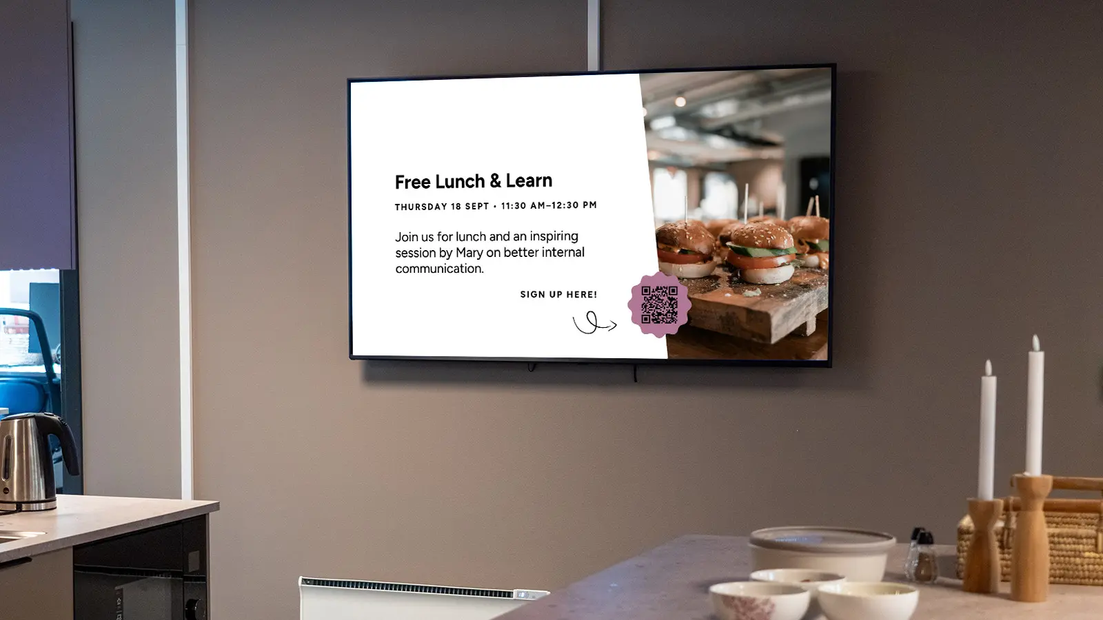 Poster displayed on a digital signage screen in a staff room.