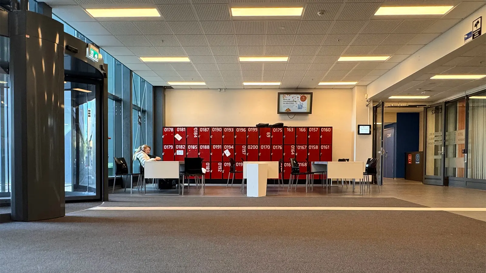 One of the school’s entrance areas, with seating and book lockers.